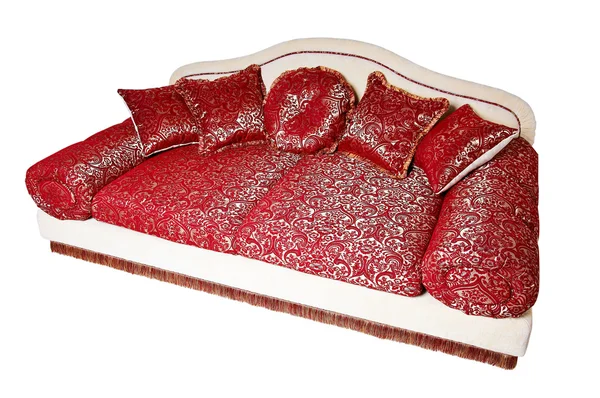 Schönes rotes Sofa mit Kissen — Stockfoto