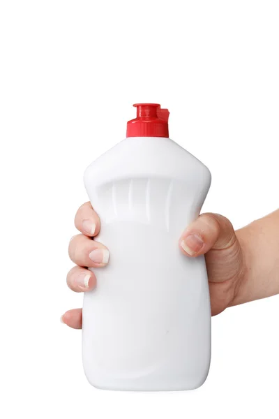 Hand met een wasmiddel plastic fles geïsoleerd op witte CHTERGRO — Stockfoto