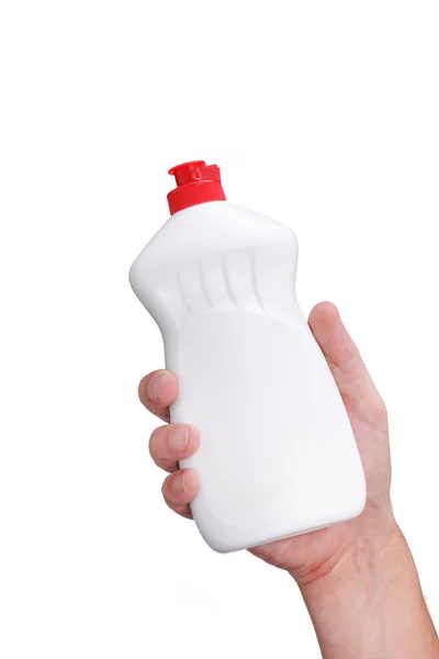 Hand with a detergent plastic bottle isolated on white backgrou — Stock Photo, Image