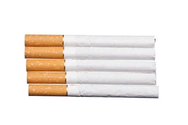 Closeup of a pile of cigarettes isolated on white background — Stock Photo, Image