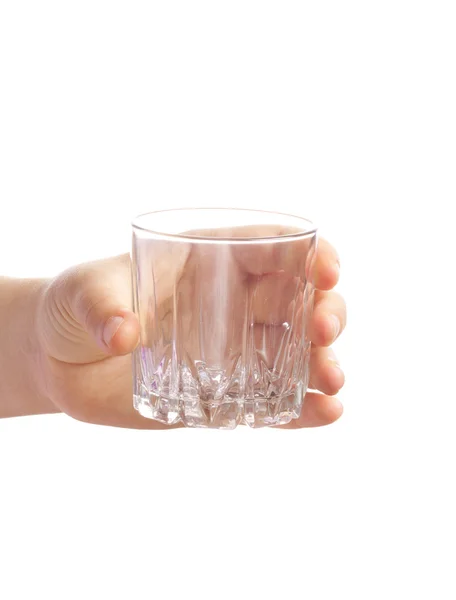 Een leeg glas in hand op witte achtergrond — Stockfoto