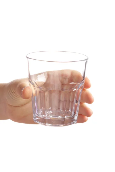 Een leeg glas in hand op witte achtergrond — Stockfoto