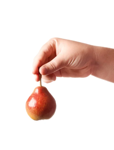 Pear hanging from hand isolated on white background — Stock Photo, Image