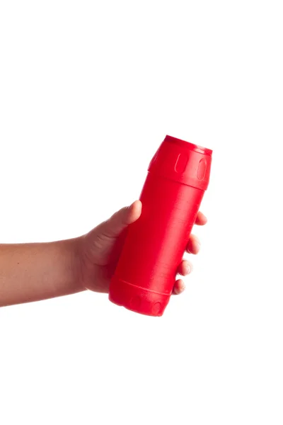 Κόκκινο μπουκάλι με τον καθαρισμό της σκόνης που απομονώνονται σε λευκό — Φωτογραφία Αρχείου