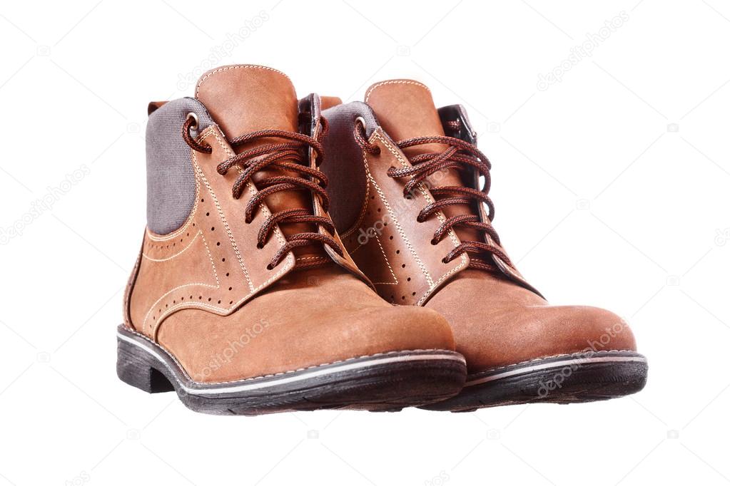 Pair of new hiking boots on white background