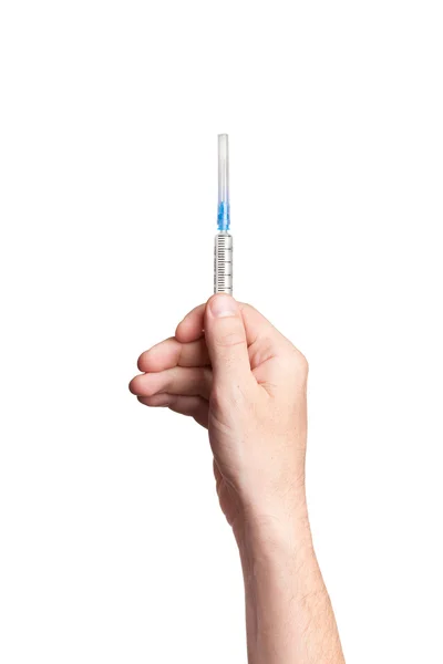 Hand holding syringe isolated on white background — Stock Photo, Image