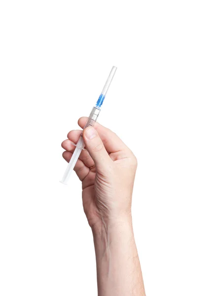 Hand holding syringe isolated on white background — Stock Photo, Image