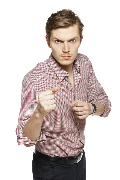 Aggressive man against a white background — Stock Photo, Image