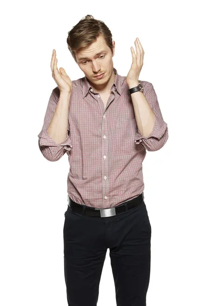 Young man against a white background — Stock Photo, Image