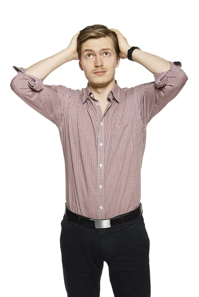 Young man against a white background — Stock Photo, Image