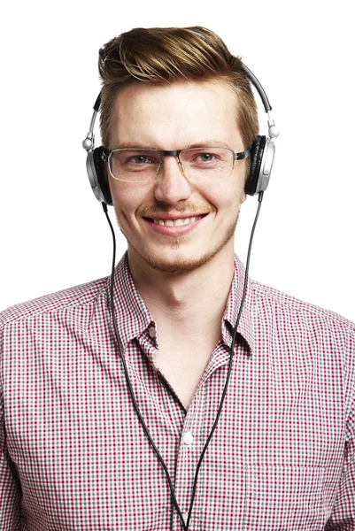 Escucha y sonríe con auriculares — Foto de Stock