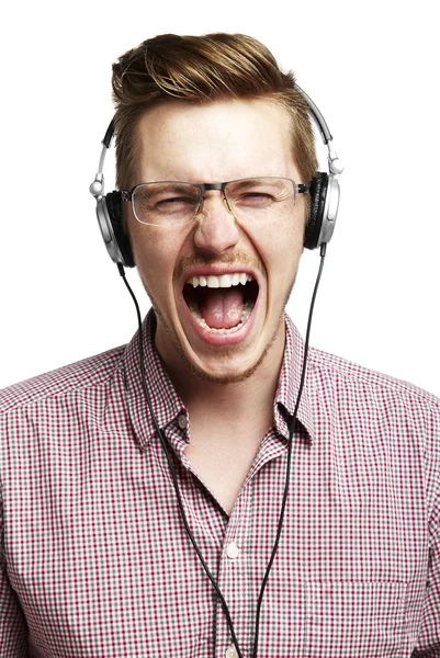 Listening to music and singing with headphones — Stock Photo, Image