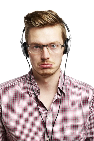 Zuhören und sich Sorgen machen mit Kopfhörern — Stockfoto