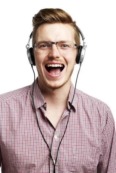 Escuchar música y cantar con auriculares — Foto de Stock