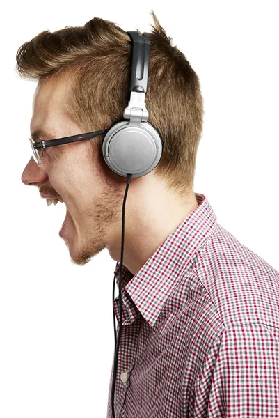 Escuchar música y cantar con auriculares — Foto de Stock