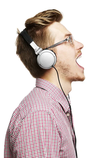 Escuchar música y cantar con auriculares — Foto de Stock