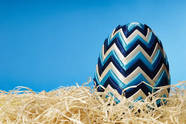 Easter egg in hay — Stock Photo, Image