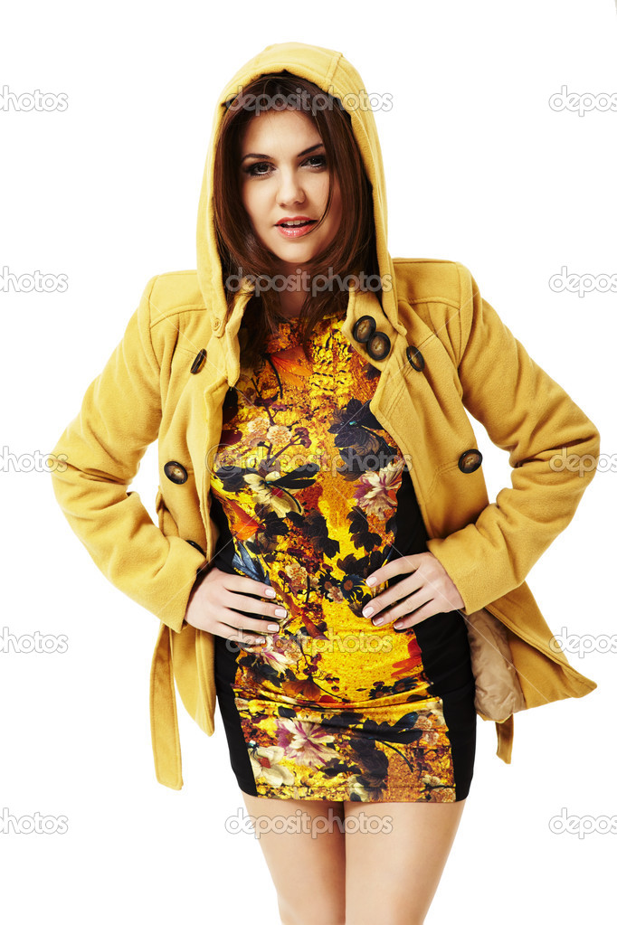 Attractive woman in yellow coat