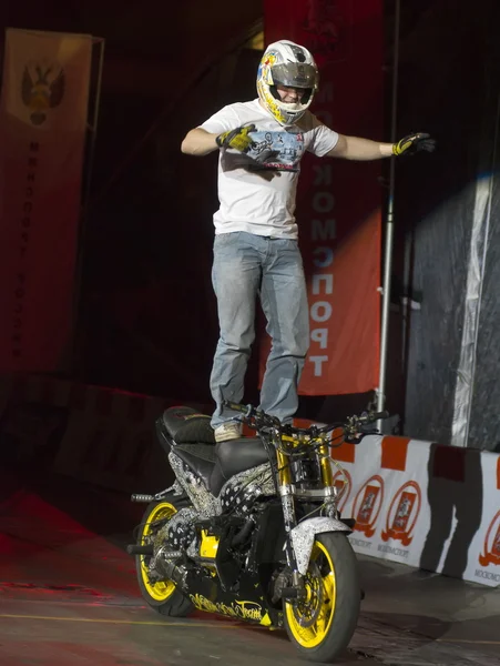 Standing on a motorcycle — Stock Photo, Image