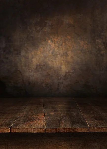 Wooden table with old wall — Stock Photo, Image