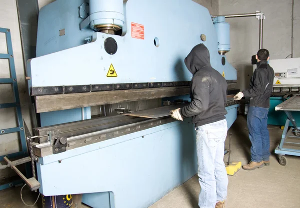 Men working with steel — Stock Photo, Image