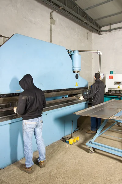 Men working with steel — Stock Photo, Image