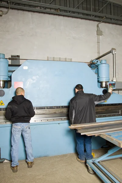 Men working with steel — Stock Photo, Image