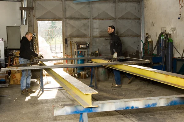 Men working with steel — Stock Photo, Image