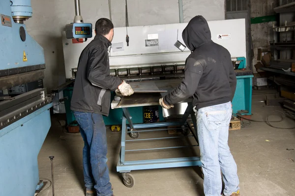 Men working with steel — Stock Photo, Image