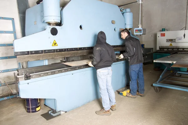 Men working with steel — Stock Photo, Image