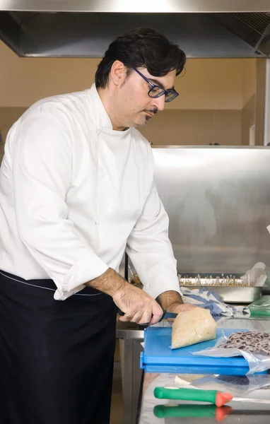 Cook in the kitchen — Stock Photo, Image