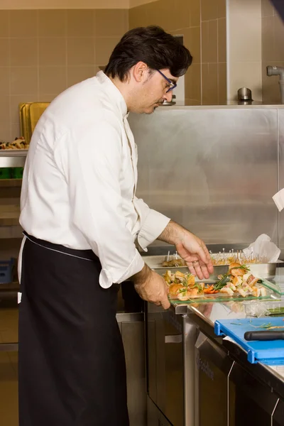 Cook in the kitchen — Stock Photo, Image