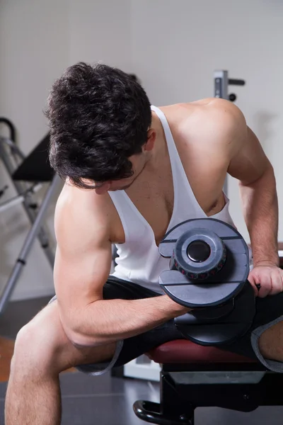 Athlete in the gym — Stock Photo, Image