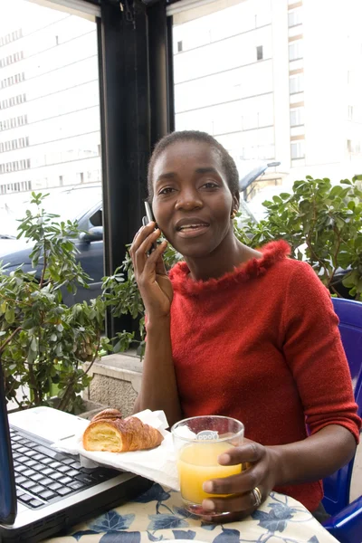 Woman having breakfast in cafe — Stock Photo, Image