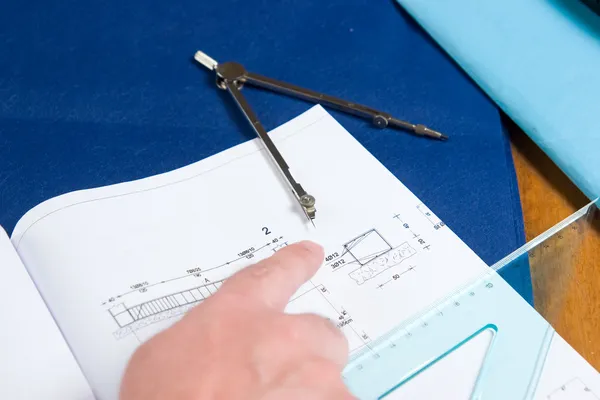 Designer pointing on design sketch — Stock Photo, Image