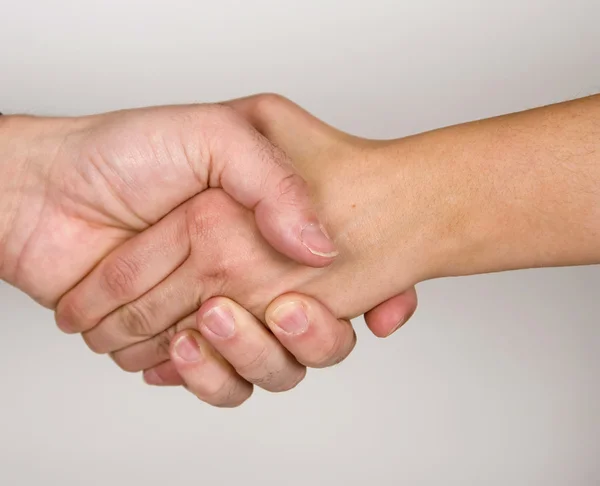 Man and woman are shaking hands — Stock Photo, Image