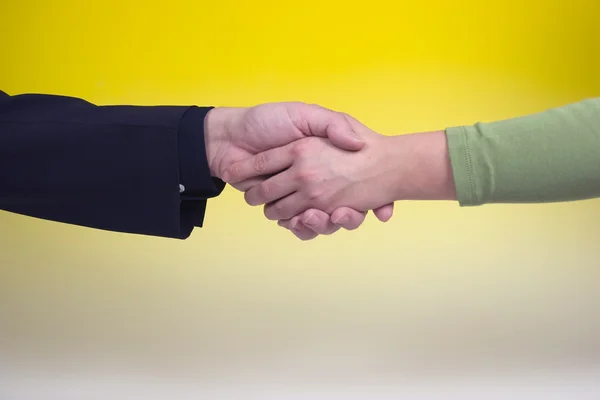 Man and woman are shaking hands — Stock Photo, Image