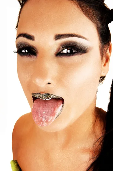 Girl showing tongue. Stock Image