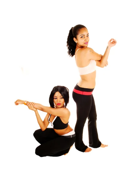 Two girls stretching. — Stock Photo, Image