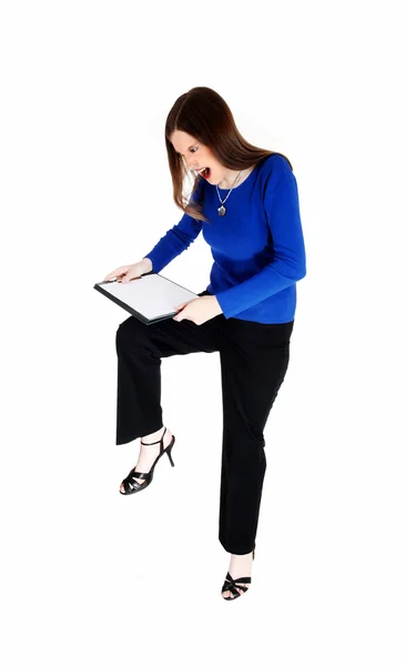 Woman breaking her clip board. — Stock Photo, Image