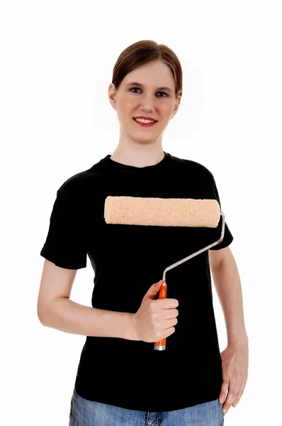 Woman holding paint roller. — Stock Photo, Image