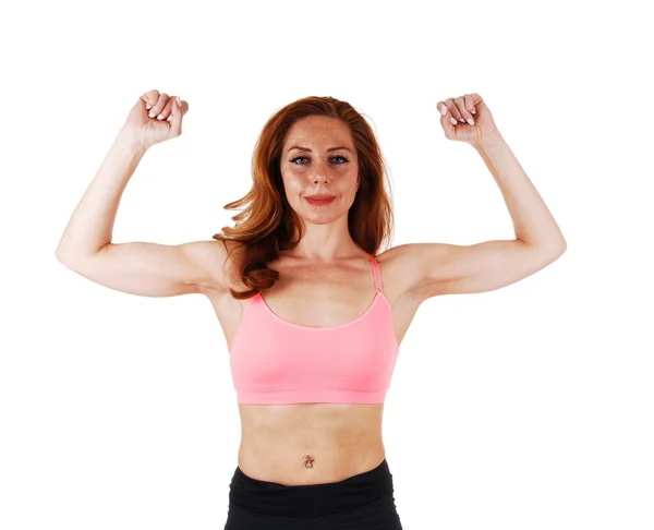 Mulher mostrando seus músculos. — Fotografia de Stock