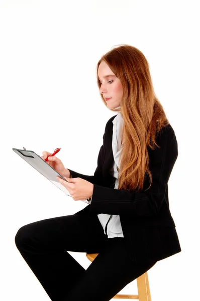 Businesswoman writing. — Stock Photo, Image