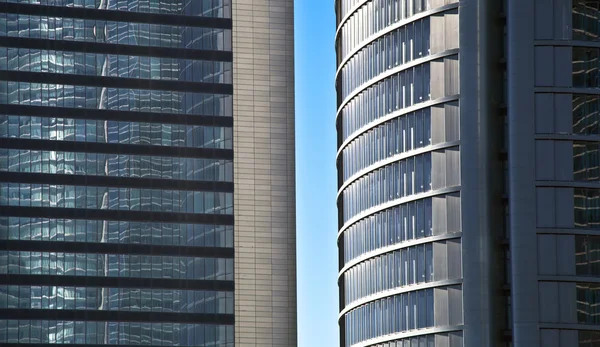 Blue glass high rise building skyscrapers — Stock Photo, Image