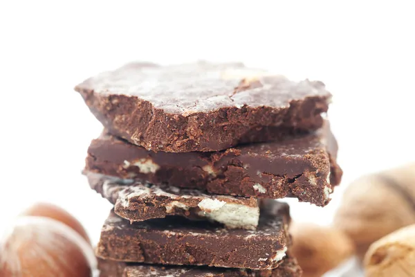 Pile de chocolat et isolé sur blanc — Photo