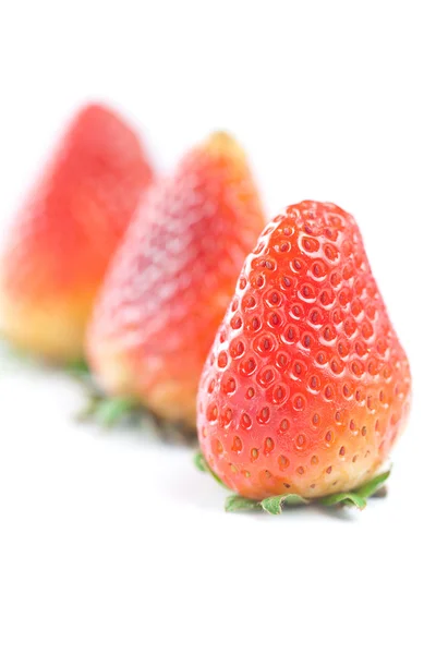 Velké červené jahody izolovaných na bílém — Stock fotografie
