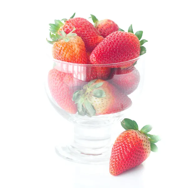 Big red strawberries in a glass bowl — Stock Photo, Image