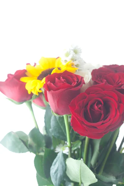 Bouquet of red roses and sunflower in a vase — Stock Photo, Image