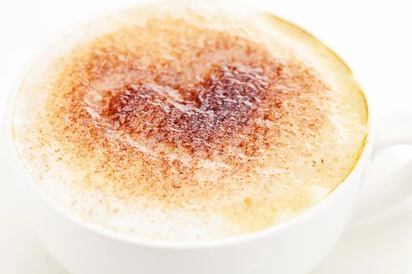 Cappuccino in a cup in the shape of hearts — Stock Photo, Image
