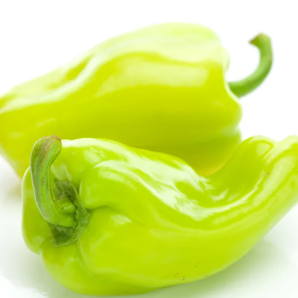 Two green peppers isolated on white — Stock Photo, Image